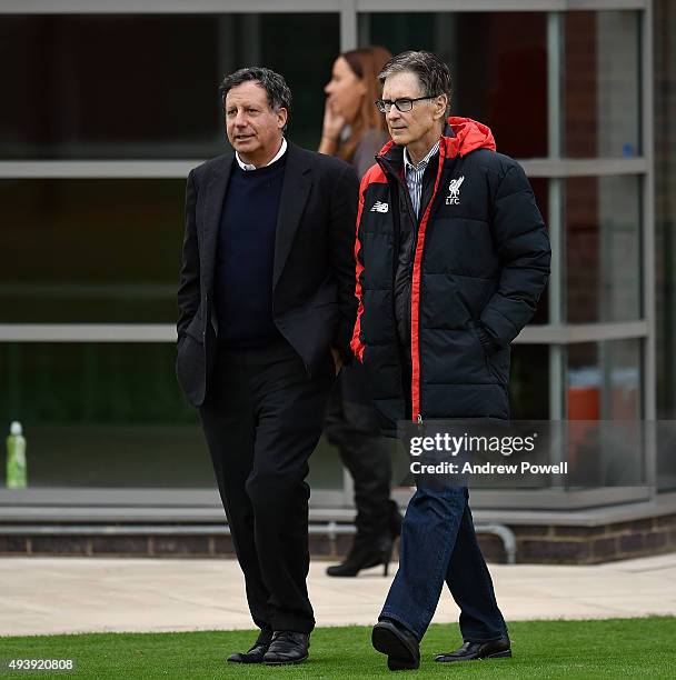 John W Henry and Tom Werner part owners of Liverpool FC watch a training session at Melwood Training Ground on October 23, 2015 in Liverpool, England.