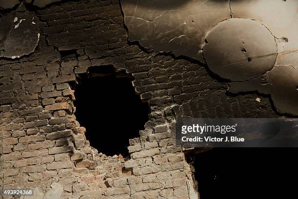 Hole in a wall on October 14 in Kunduz, Afghanistan, caused by a shell from the AC-130 plane that struck the Medecins Sans Frontieres hospital in...
