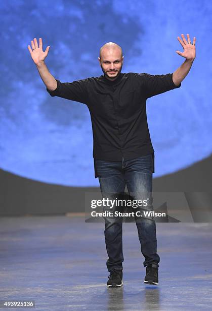 Dany Tabet walks the runway after his show during Dubai Fashion Forward Spring/Summer 2016 at Madinat Jumeirah on October 23, 2015 in Dubai, United...