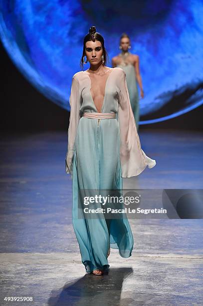 Model walks the runway at the Dany Tabet show during Dubai Fashion Forward Spring/Summer 2016 at Madinat Jumeirah on October 23, 2015 in Dubai,...