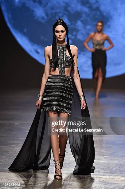 Model walks the runway at the Dany Tabet show during Dubai Fashion Forward Spring/Summer 2016 at Madinat Jumeirah on October 23, 2015 in Dubai,...