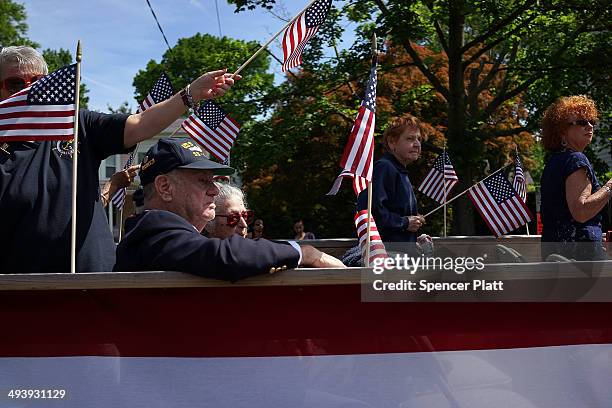 Area veterans participate in the annual Memorial Day Parade on May 26, 2014 in Fairfield, Connecticut. Across America towns and cities will be...