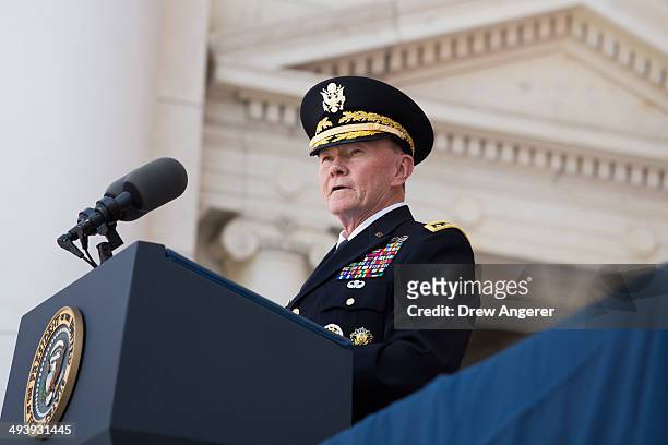 Martin Dempsey, Chairman of the Joint Chiefs of Staff, speaks during a Memorial Day event at Arlington National Cemetery, May 26, 2014 in Arlington,...