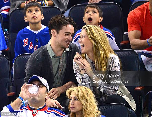 Vincent Piazza and guest attend Montreal Canadiens vs New York Rangers playoff game at Madison Square Garden on May 25, 2014 in New York City.