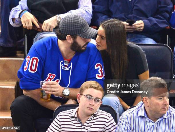 Matt Harvey and Asha Leo attend Montreal Canadiens vs New York Rangers playoff game at Madison Square Garden on May 25, 2014 in New York City.