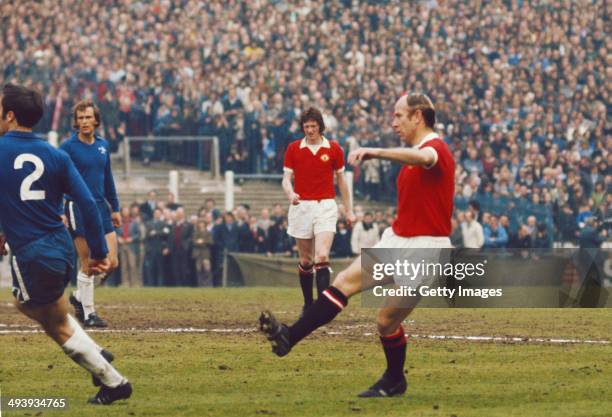 Bobby Charlton in action on his last appearance for United watched by Arnie Sidebottom of United during the League Division One match between Chelsea...