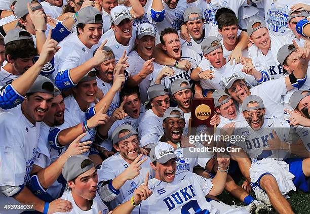 Members of the Duke Blue Devils celebrate after defeating the Notre Dame Fighting Irish 11-9 to win the 2014 NCAA Division I Men's Lacrosse...