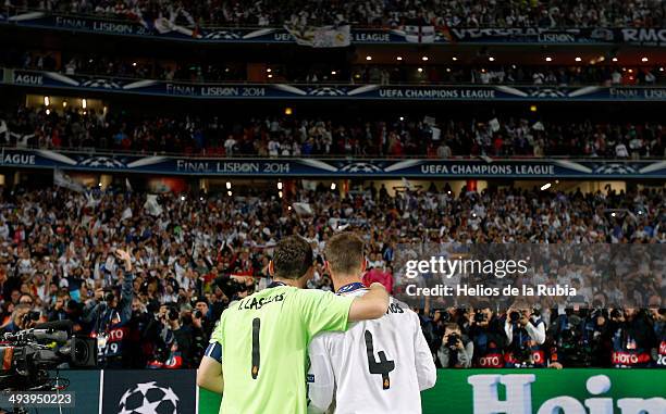 Iker Casillas and Sergio Ramos poses during the Real Madrid celebration the day after winning the UEFA Champions League Final at Estadio da Luz on...