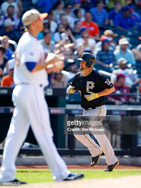 Gaby Sanchez of the Pittsburgh Pirates runs the bases after his eighth-inning home run against Scott Rice of the New York Mets at Citi Field on May...