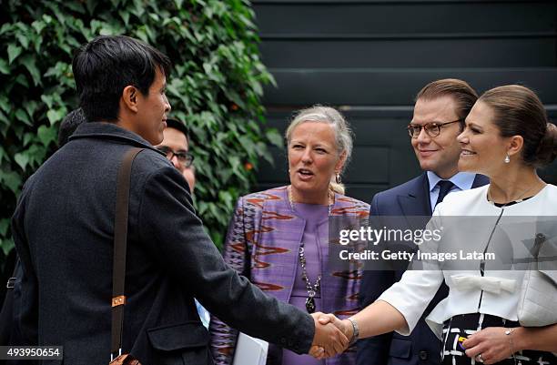 Crown Princess Victoria of Sweden and Prince Daniel of Sweden are greeted during a meeting with leaders of the Swedish Colombian alumni network at...