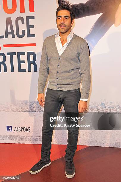 Ary Abittan attends the 'Amour Sur Place' Paris Premiere at Cinema Gaumont Capucine on May 26, 2014 in Paris, France.