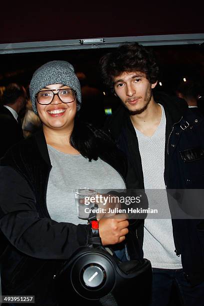 Melha Bedia and guest attend "Amour Sur Place" Paris Premiere at Cinema Gaumont Capucine on May 26, 2014 in Paris, France.