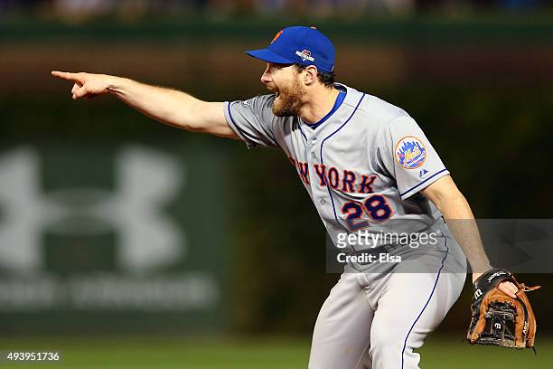 Daniel Murphy of the New York Mets points in the ninth inning against the Chicago Cubs during game four of the 2015 MLB National League Championship...
