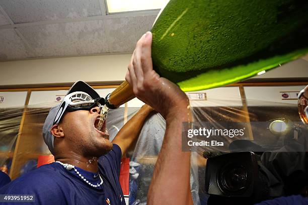 Jeurys Familia of the New York Mets celebrates in the locker room with his teammates after defeating the Chicago Cubs in game four of the 2015 MLB...