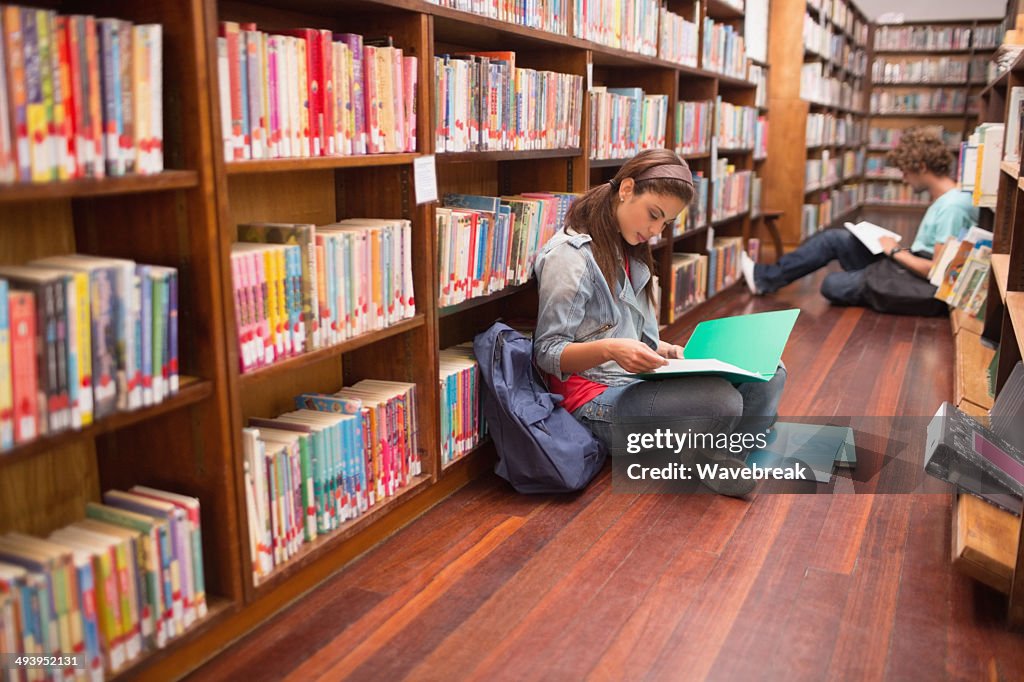 Student Read Notes Students Reading Notes On Floor In Library High-Res Stock Photo - Getty ...