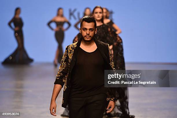 Yousef Al-Jasmi walks the runway after his show during Dubai Fashion Forward Spring/Summer 2016 at Madinat Jumeirah on October 23, 2015 in Dubai,...