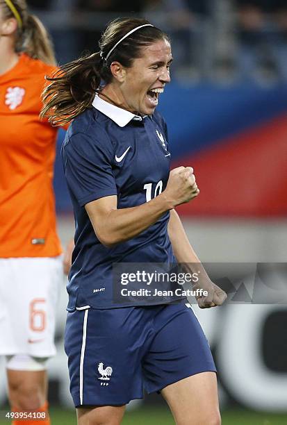 Camille Abily of France celebrates scoring the first goal of France during the women's international friendly match between France and The...