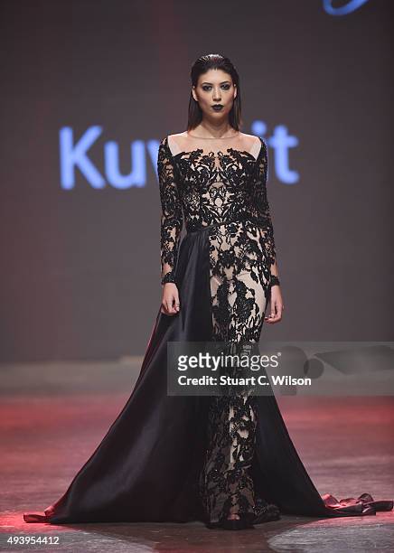 Model walks the runway at the Yousef Al-Jasmi show during Dubai Fashion Forward Spring/Summer 2016 at Madinat Jumeirah on October 23, 2015 in Dubai,...