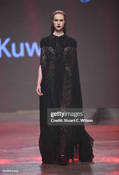 Model walks the runway at the Yousef Al-Jasmi show during Dubai Fashion Forward Spring/Summer 2016 at Madinat Jumeirah on October 23, 2015 in Dubai,...