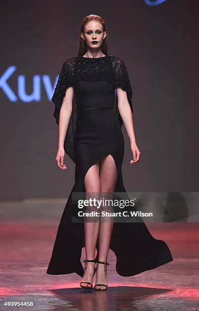 Model walks the runway at the Yousef Al-Jasmi show during Dubai Fashion Forward Spring/Summer 2016 at Madinat Jumeirah on October 23, 2015 in Dubai,...