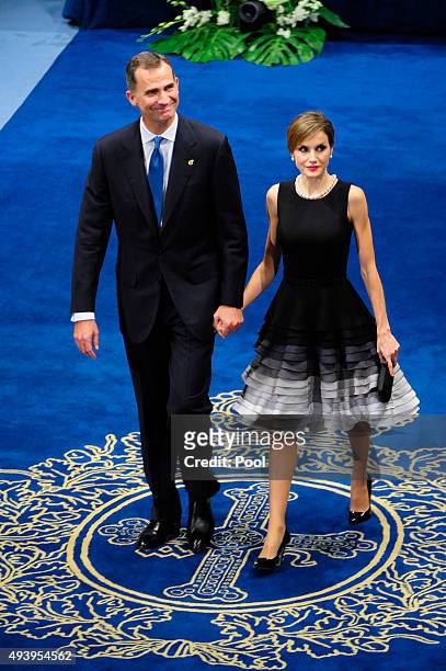 King Felipe VI of Spain and Queen Letizia of Spain attend the Princess of Asturias Awards 2015 at the Campoamor Theater on October 23, 2015 in...