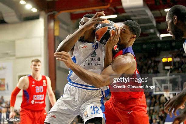 Jarvis Varnado, #32 of Dinamo Banco di Sardegna Sassari competes with Kyle Hines, #42 of CSKA Moscow during the Turkish Airlines Euroleague Regular...