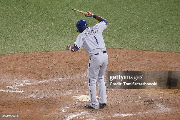 Elvis Andrus of the Texas Rangers throws his bat as he strikes out to end the eighth inning against the Toronto Blue Jays during game five of the...