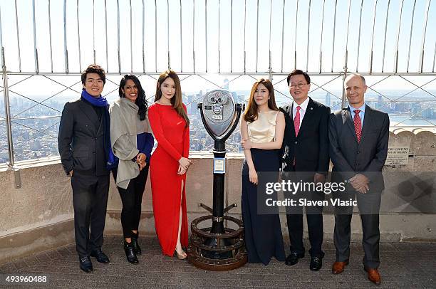 Pianist Lang Lang, NYC Commissioner for International Affairs Penny Abeywardena, musicians Kang Minkyung and Lee Haeri of pop duo Davichi and guests...