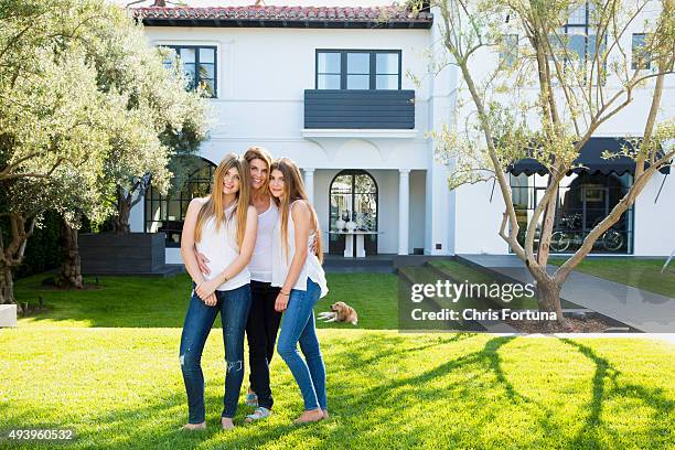 Actress Lori Loughlin is photographed with daughters Olivia and Isabella at home for People Magazine on May 19, 2015 in Los Angeles, California.