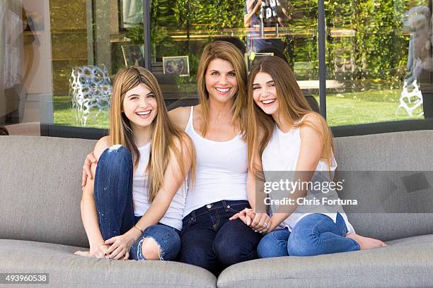 Actress Lori Loughlin is photographed with daughters Olivia and Isabella at home for People Magazine on May 19, 2015 in Los Angeles, California.