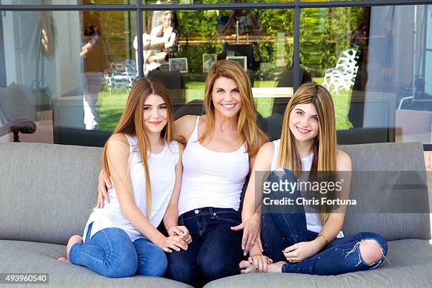 Actress Lori Loughlin is photographed with daughters Olivia and Isabella at home for People Magazine on May 19, 2015 in Los Angeles, California.