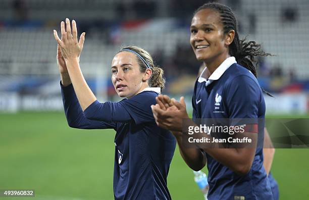 Sabrina Delannoy and Wendie Renard of France thank the fans after the women's international friendly match between France and The Netherlands at...