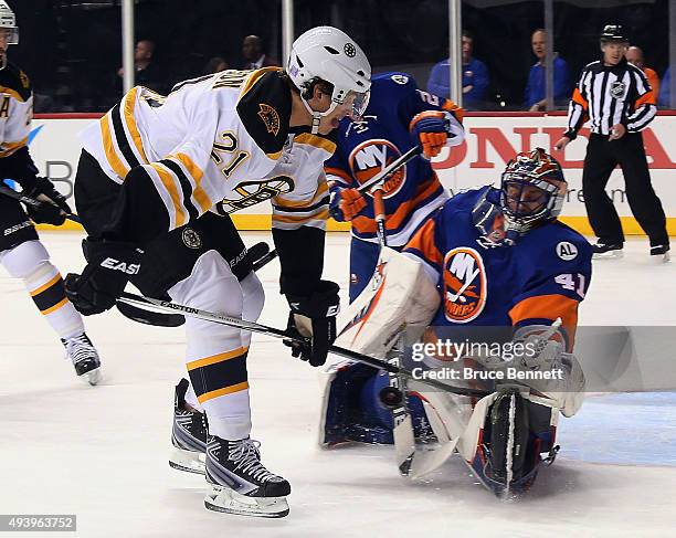 Jaroslav Halak of the New York Islanders makes the first period stop on Loui Eriksson of the Boston Bruins at the Barclays Center on October 23, 2015...