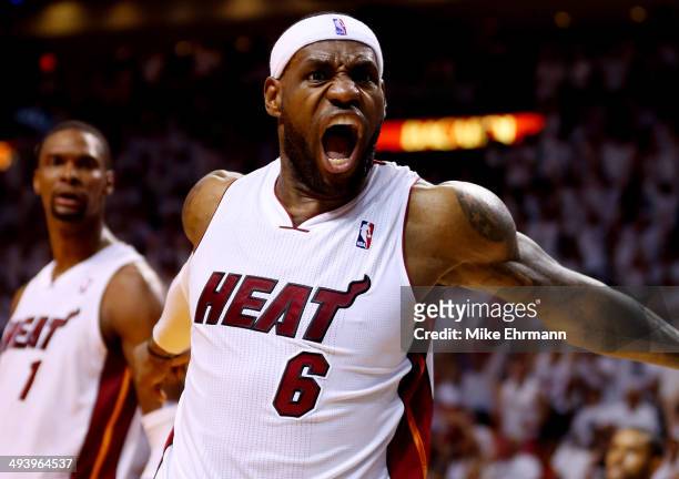 LeBron James of the Miami Heat reacts after a basket against the Indiana Pacers during Game Four of the Eastern Conference Finals of the 2014 NBA...