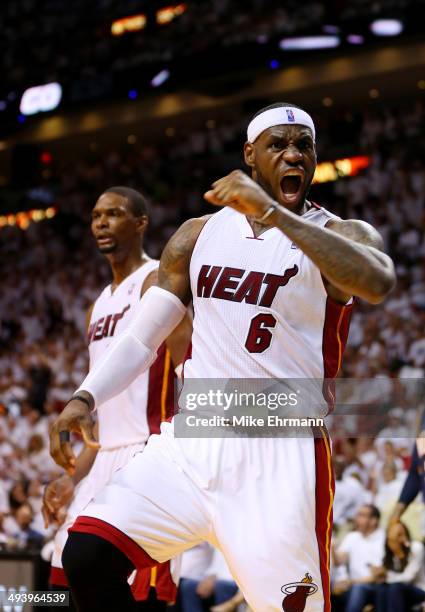 LeBron James of the Miami Heat reacts after a basket against the Indiana Pacers during Game Four of the Eastern Conference Finals of the 2014 NBA...