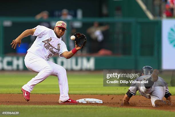 Brett Gardner of the New York Yankees is caught stealing second base by Jhonny Peralta of the St. Louis Cardinals in the eighth inning at Busch...