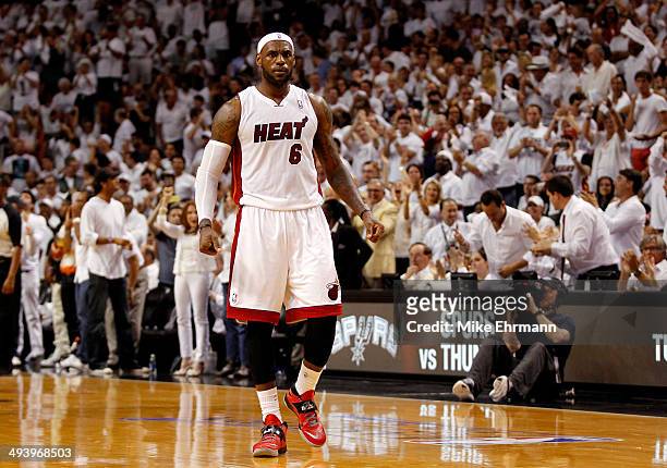 LeBron James of the Miami Heat reacts against the Indiana Pacers during Game Four of the Eastern Conference Finals of the 2014 NBA Playoffs at...