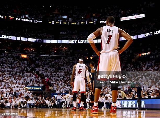 Chris Bosh of the Miami Heat looks on against the Indiana Pacers during Game Four of the Eastern Conference Finals of the 2014 NBA Playoffs at...