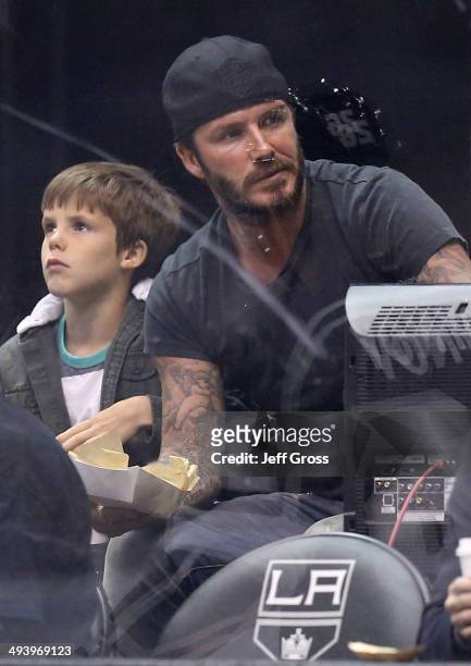 David Beckham watches as the Los Angeles Kings take on the Chicago Blackhawks in Game Four of the Western Conference Final during the 2014 Stanley...