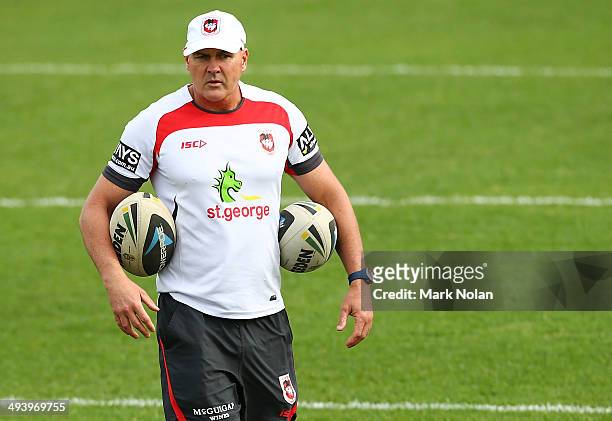 New Dragons coach Paul McGregor watches over his players during a St George Illawarra Dragons NRL training session at WIN Stadium on May 27, 2014 in...