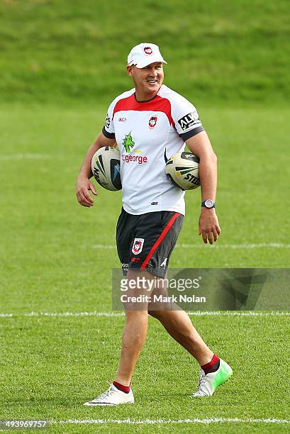 New Dragons coach Paul McGregor watches over his players during a St George Illawarra Dragons NRL training session at WIN Stadium on May 27, 2014 in...