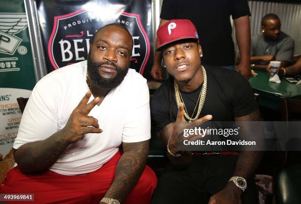 Rick Ross and Ace Hood meet and greet fans at Wing Stop on May 26, 2014 in Deerfield Beach, Florida.