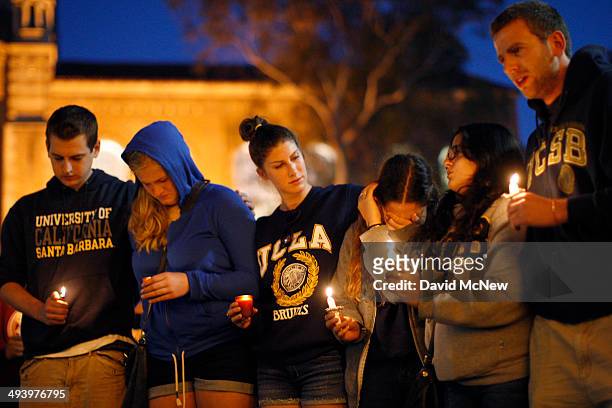 Students of UCSB and UCLA mourn at a candlelight vigil at UCLA for the victims of a killing rampage over the weekend near UCSB on May 26, 2014 in Los...