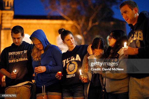 Students of UCSB and UCLA mourn at a candlelight vigil at UCLA for the victims of a killing rampage over the weekend near UCSB on May 26, 2014 in Los...