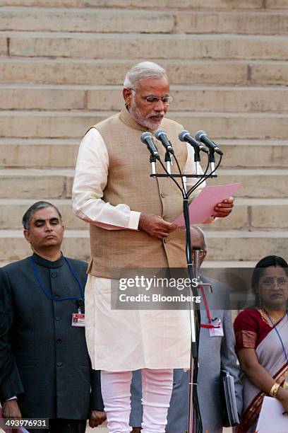 Narendra Modi, India's new prime minister, speaks during a swearing in ceremony for the prime minister and other members of the cabinet at the...