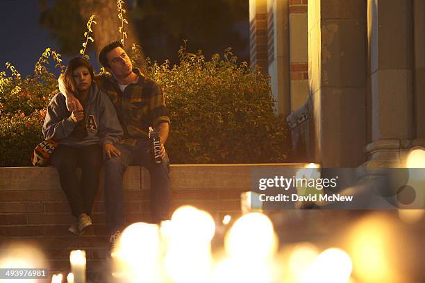 Students of UCSB and UCLA mourn at a candlelight vigil at UCLA for the victims of a killing rampage over the weekend near UCSB on May 26, 2014 in Los...