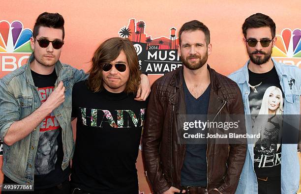 Musicians Dan Smith, Chris Wood, Will Farquarson and Kyle Simmons of Bastille arrive at the 2014 iHeartRadio Music Awards at The Shrine Auditorium on...