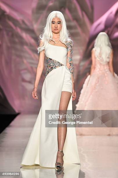 Model walks the runway wearing Mikael D spring 2016 collection during World MasterCard Fashion Week Spring 2016 at David Pecaut Square on October 23,...