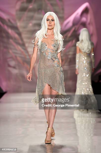 Model walks the runway wearing Mikael D spring 2016 collection during World MasterCard Fashion Week Spring 2016 at David Pecaut Square on October 23,...