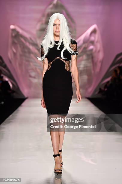 Model walks the runway wearing Mikael D spring 2016 collection during World MasterCard Fashion Week Spring 2016 at David Pecaut Square on October 23,...